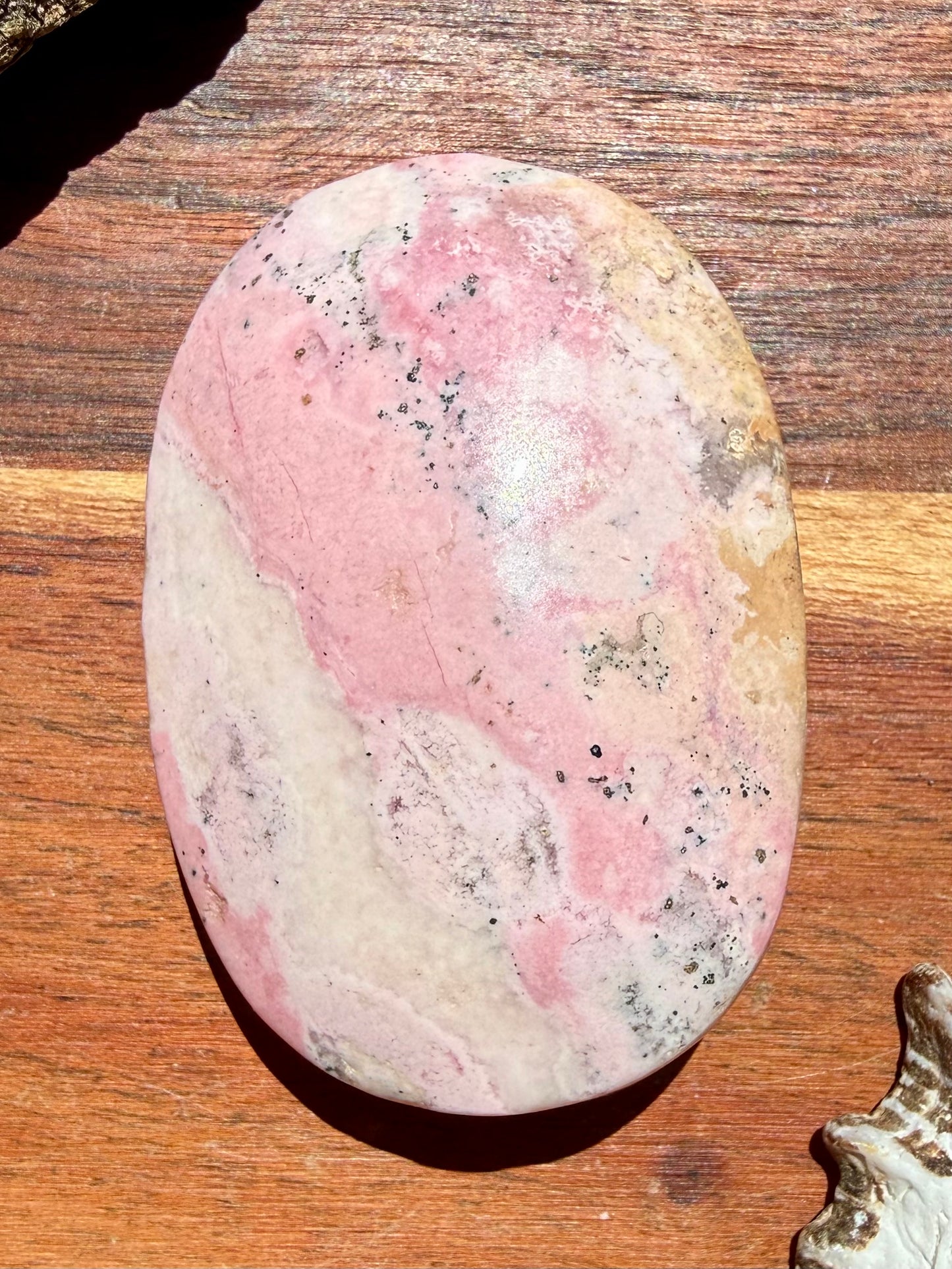 PINK PERUVIAN RHODONITE PALM STONE