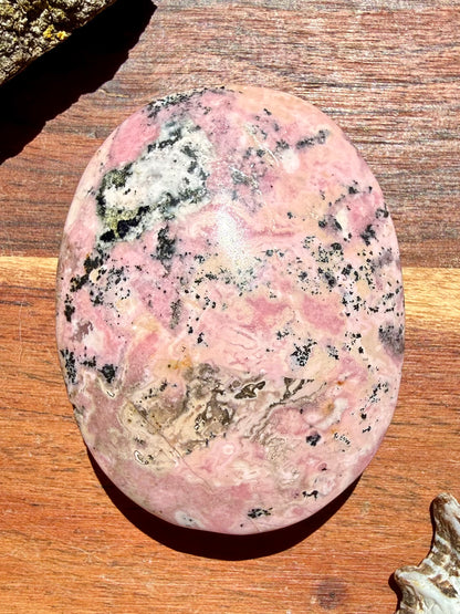 PINK PERUVIAN RHODONITE PALM STONE