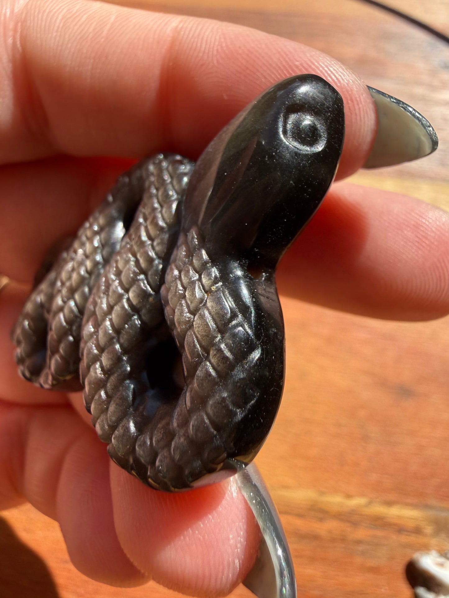 SILVER SHEEN OBSIDIAN SNAKE CARVING